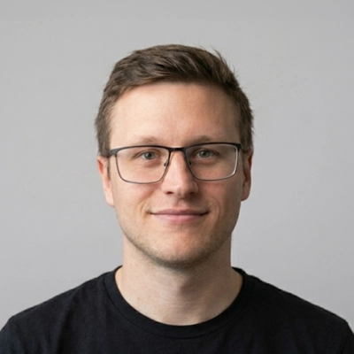 A headshot photo of Dr. Logan Hengst