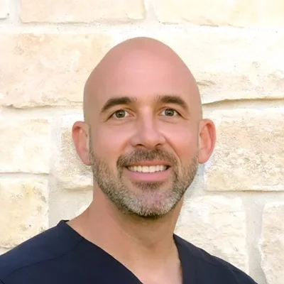 A headshot photo of Dr. Matthew George